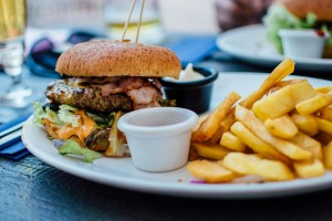 Fries and burger on plate