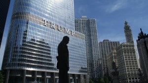 Silhouette of statue near trump building at daytime