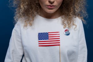 Voting woman with an american flag