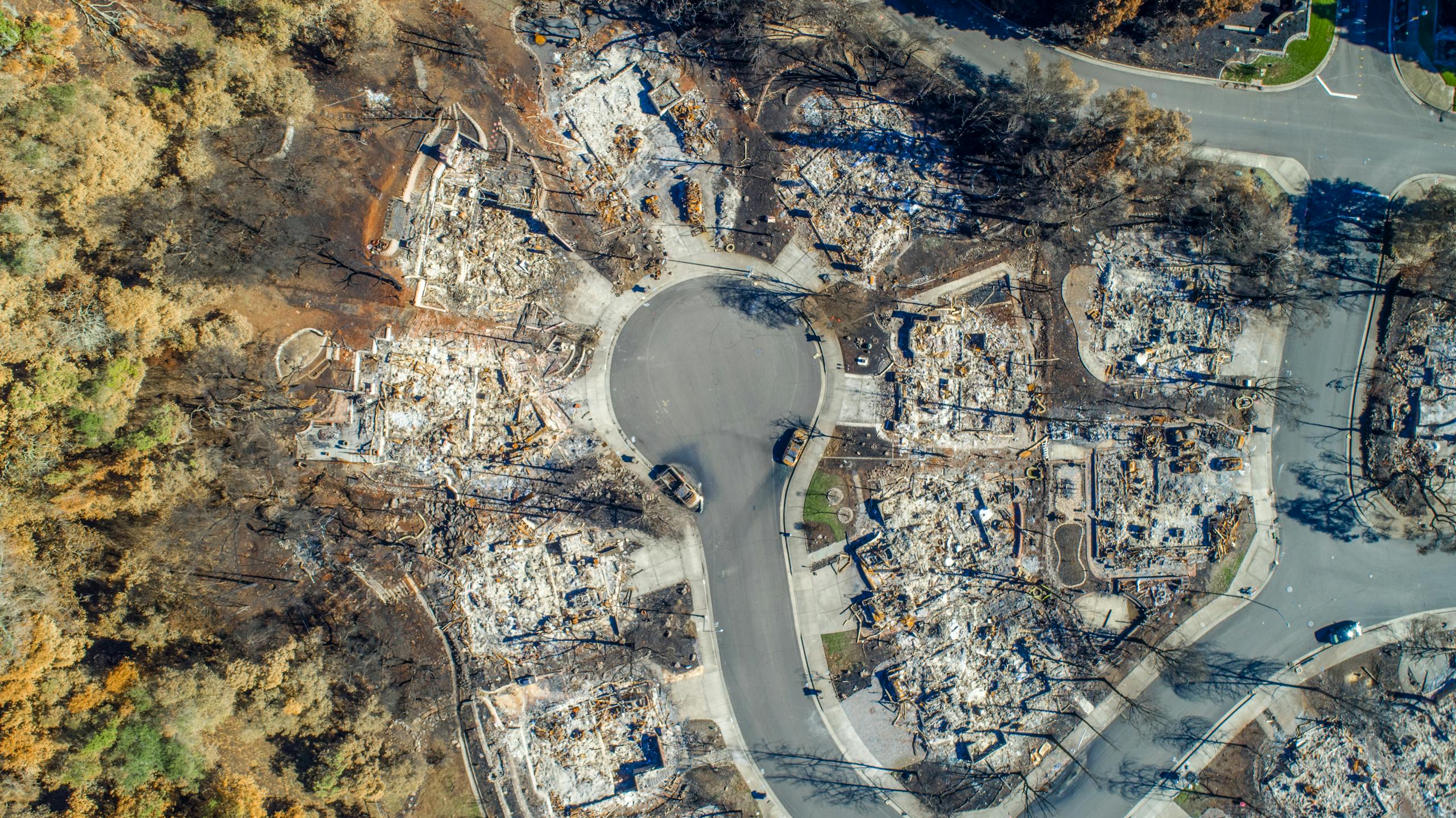 aerial view of santa rosa neighborhood devastated by tubbs fire. burned homes visible. 3964366 scaled